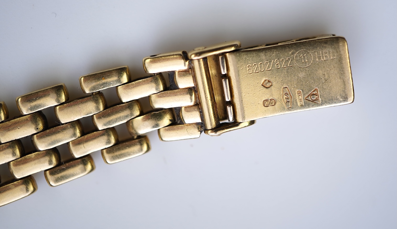 Omega, a lady's 18ct gold and diamond 'De Ville' wristwatch
